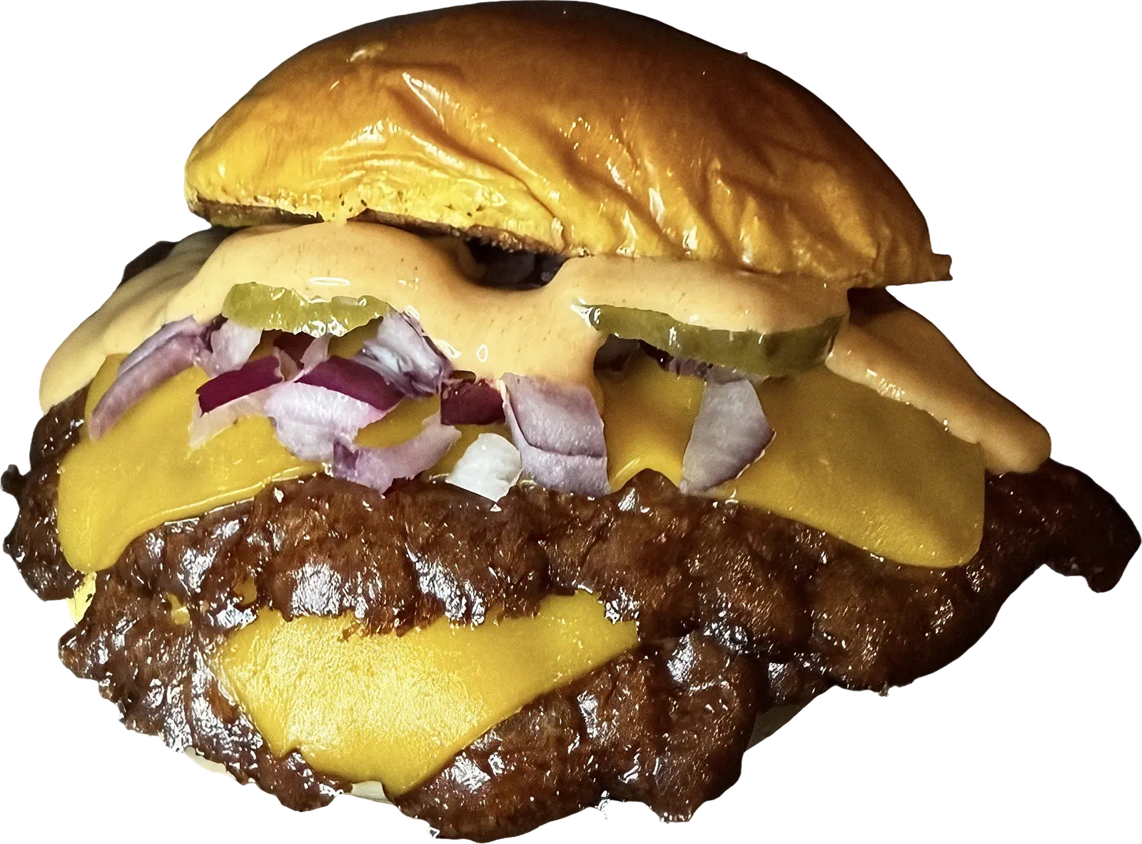 Classic Smash con doble carne, cheddar fundido, cebolla morada picada, pepinillos y salsa burger